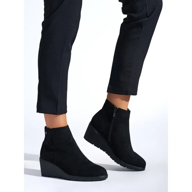 Black wedge boots