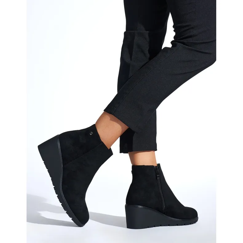 Black wedge boots