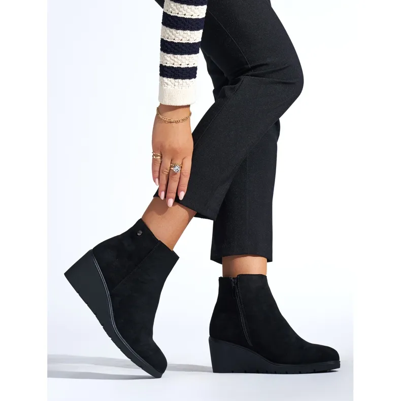 Black wedge boots