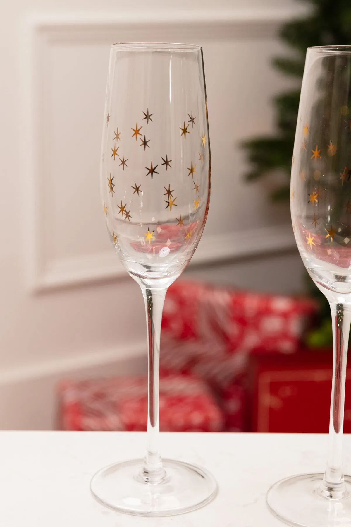 Set Of 4 Gold Star Champagne Glasses